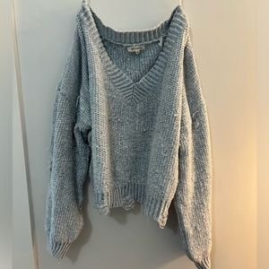 Distressed crop sweater
